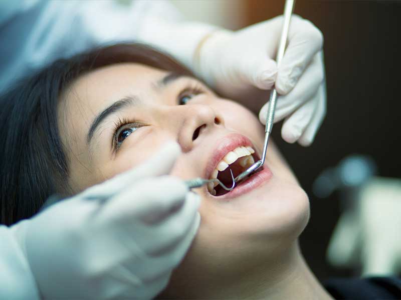 Young female patient during a teeth cleaning